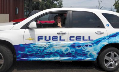 Future jobs in Michigan are likely to include those involving skills around ongoing careers like fire science and emerging fields such as automotive fuel cell technology. At left, Molly Gerarden participates in “fire school” in a co-op program at Tyco Fire Protection Products. Below, Nicole Wright takes the driver’s seat as both an intern and in a co-op with General Motors Corp.
