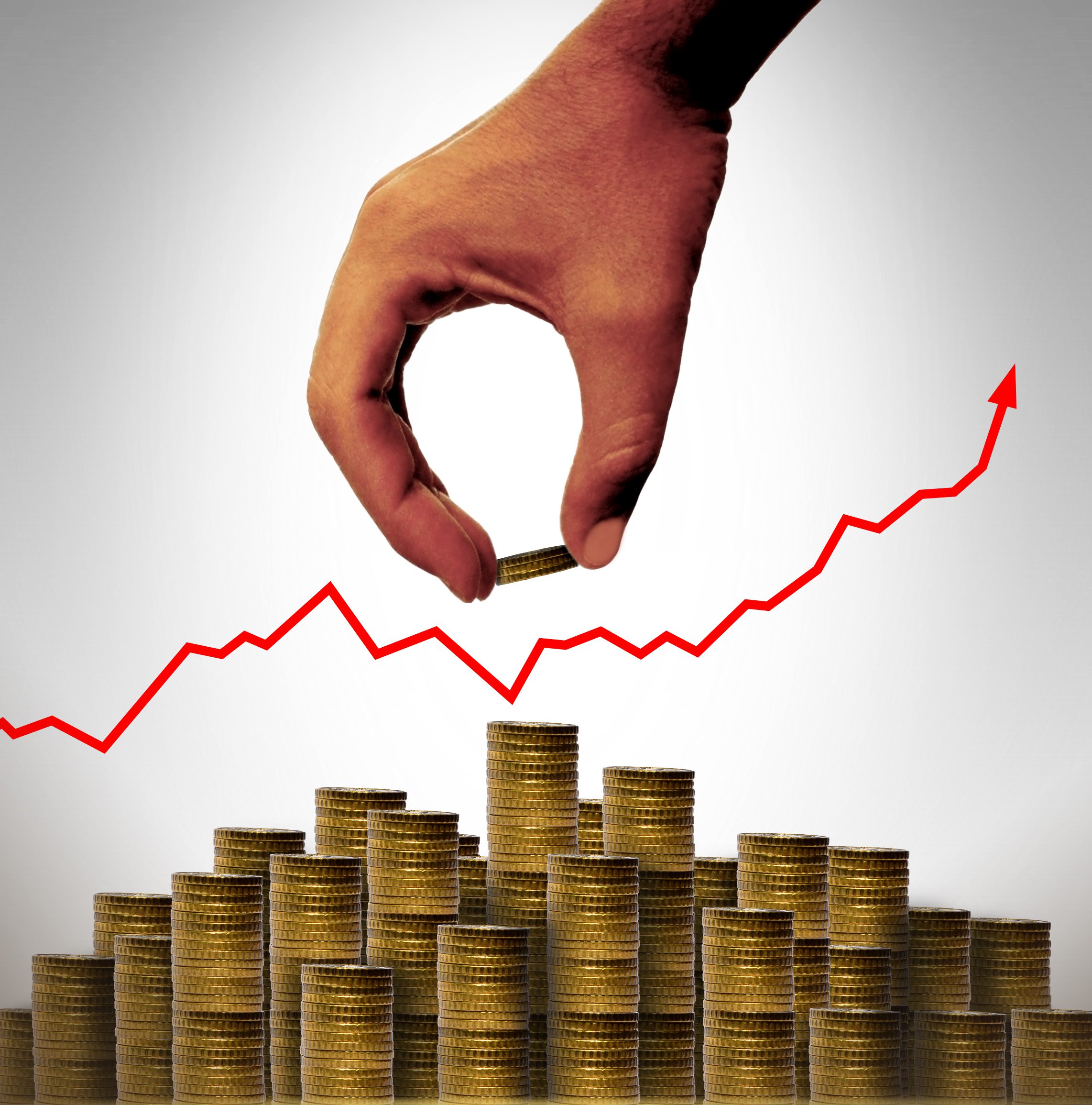 Hand placing coins on a coin stack with upward arrow