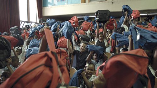 Michigan Law Firm Filling Backpacks