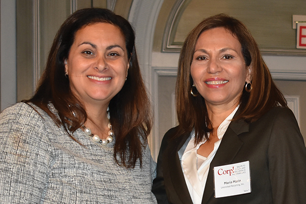 Maria Marin of Unlimited Recycling (right) accepts the Corp! Civility and Inclusion Focused Company award from Corp! President & CEO, Jennifer Kluge.