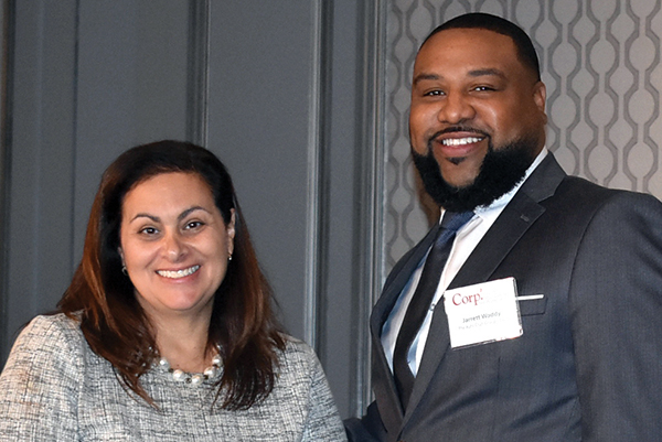 Jarrett Waddy (right) accepts his Civility and Inclusion Business Leader award from Corp! President & CEO, Jennifer Kluge.